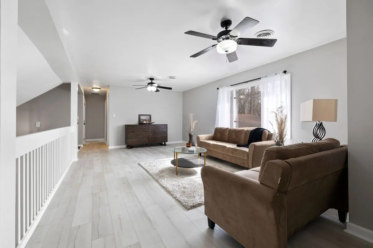 A tidy, light-filled living room after a clean